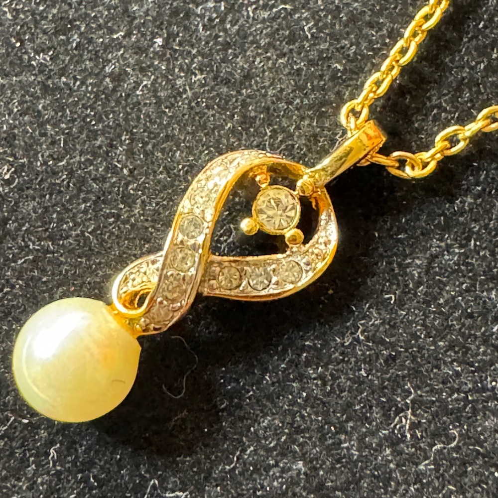 Nina Ricci Gold and Silver Infinity Necklace - Picture 9 of 9